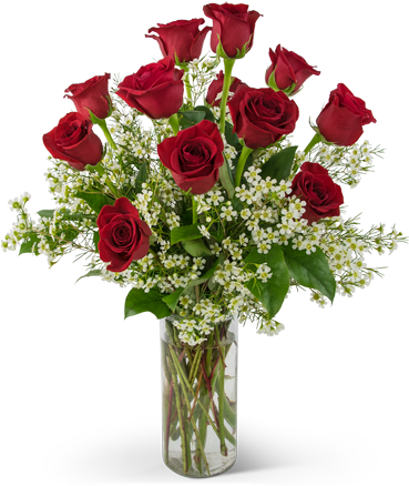 Bouquet of one dozen red roses with white wax flower in a clear vase 