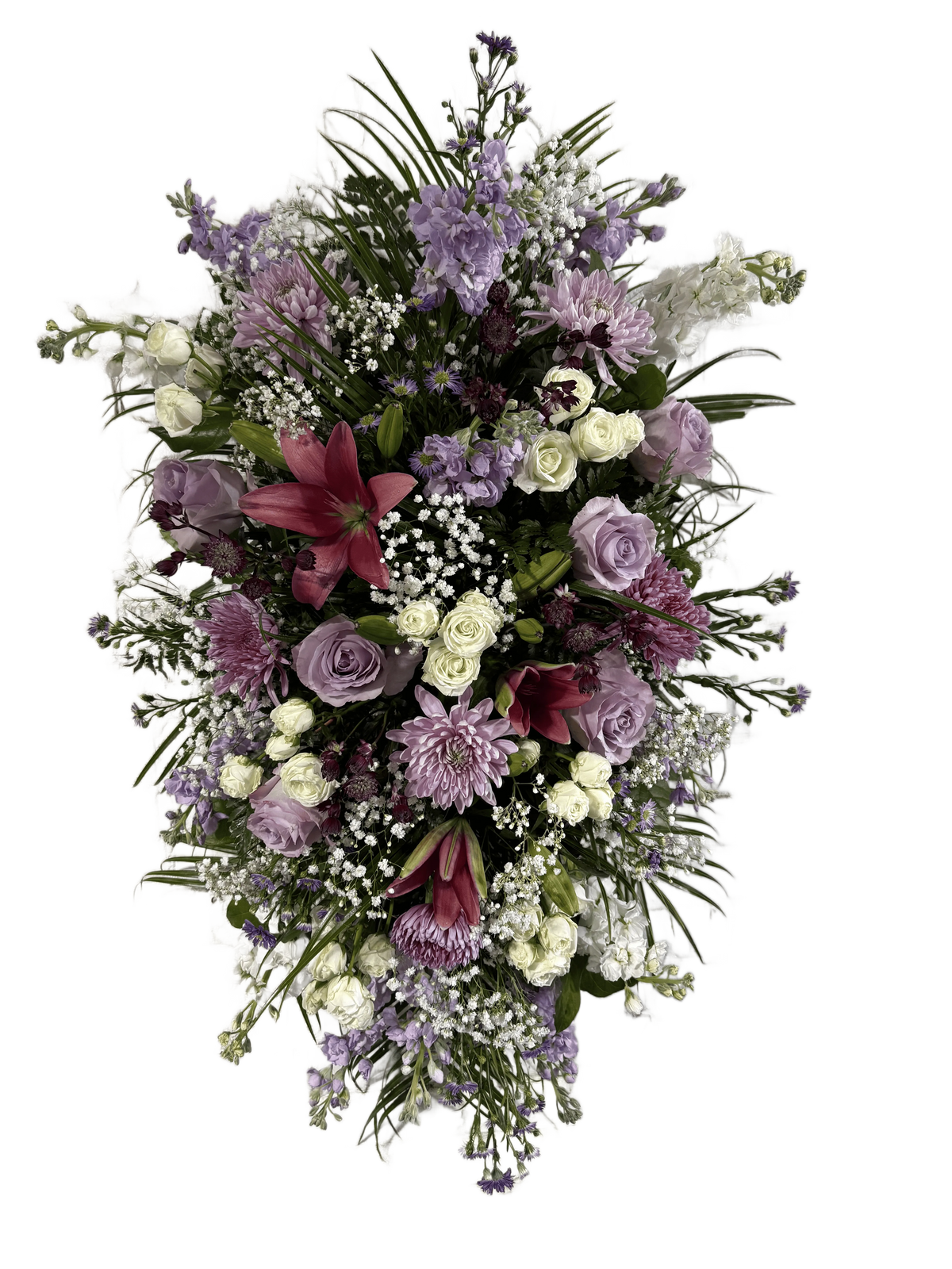 Standing spray flower arrangement with purple, pink, and white flowers 