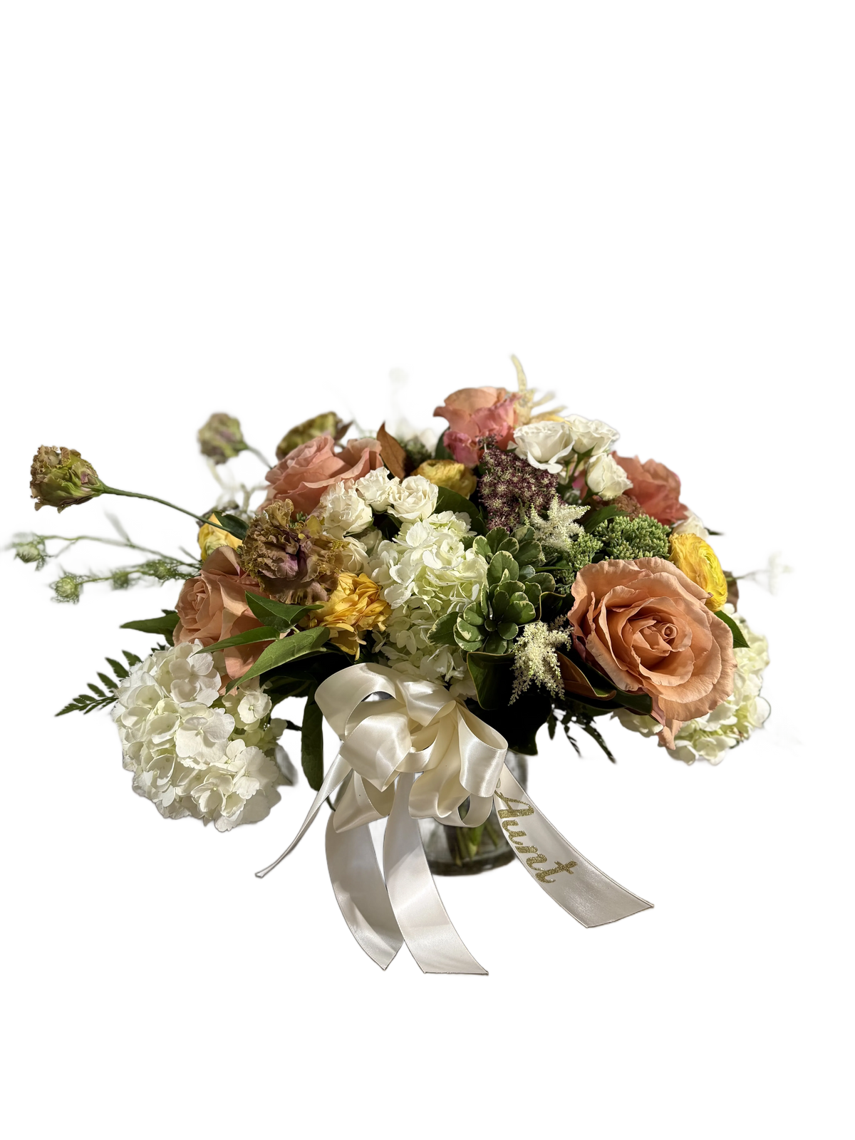 Bouquet of white, color, and yellow flowers with a white ribbon 